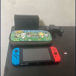 Nintendo Switch - Red/Blue Joy-Cons + Dock + 128GB SD + Joy-Con Grip + Case + Cables
