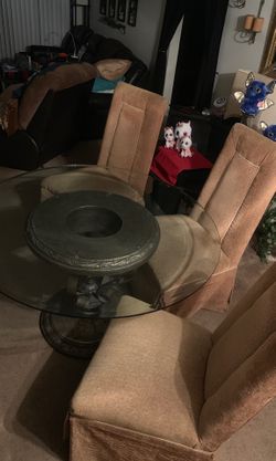 Glass table and four chairs