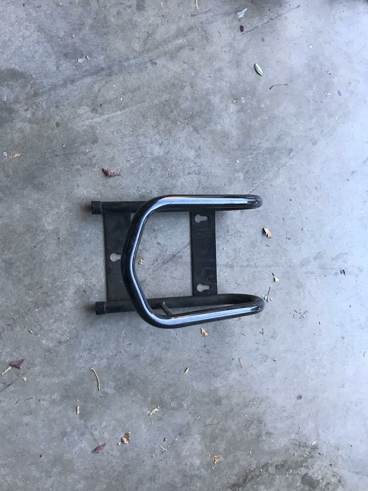 Motorcycle tire chock trailer floor