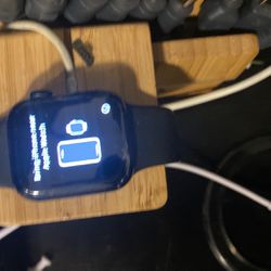 Apple Watch And Fitbit All Black 