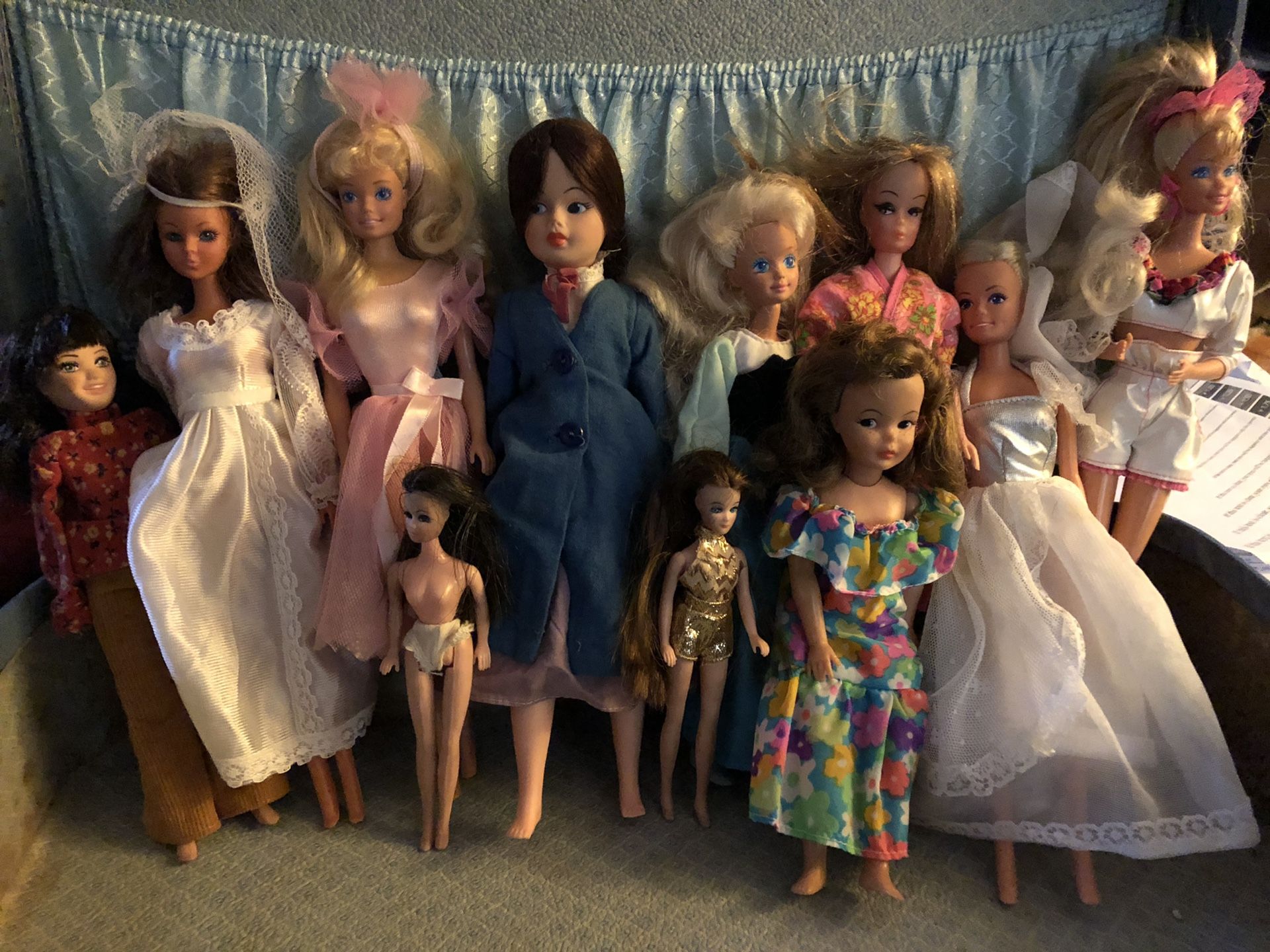 Lot of vintage collectible Barbies.