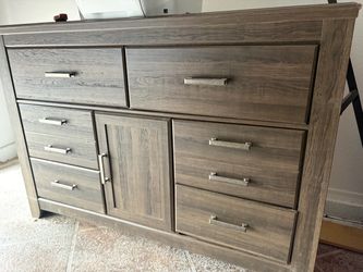Brown Wood Dresser with Drawers and Cabinet