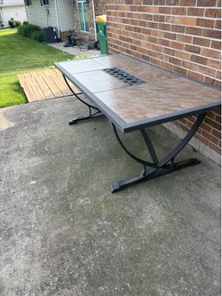 Patio table and two formal dining chairs