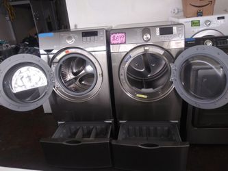 Samsung front load washer and dryer set with pedestals in excellent conditions