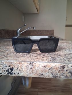 Black Luis Vuitton  sun glasses model # 21579w