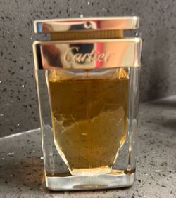 Cartier gold 16 ounce perfume