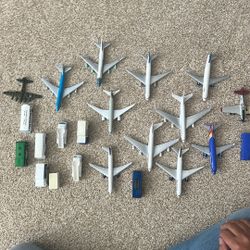 Toy Airplanes And Airport Trucks