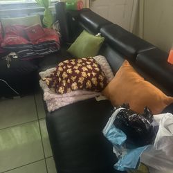 Black sectional couch foot rest bed 