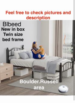 New Blbeed twin size bed frame w/slats, holds 1500lbs. Russell/Boulder area