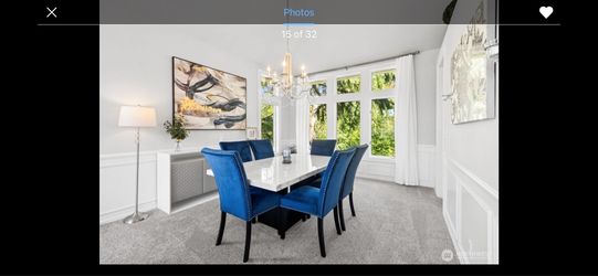 Marble dining table with 6- navy velvet upholstery chairs with metal buttons