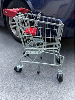 Melissa and Doug kids shopping cart