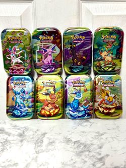 Pokemon Prismatic Evolution Mini Tins