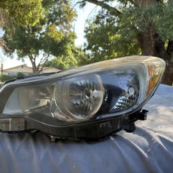 2012 Subaru Impreza left head light assembly