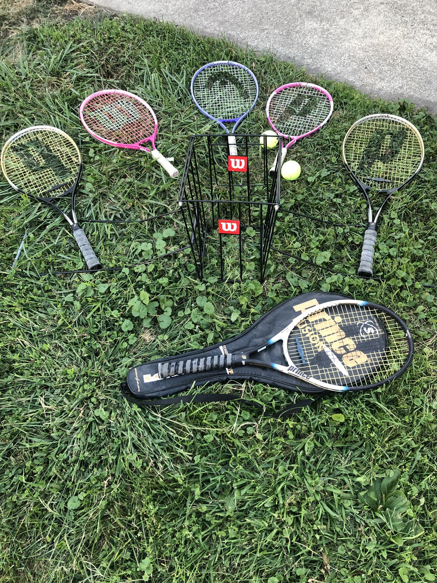 Tennis rackets and ball holder