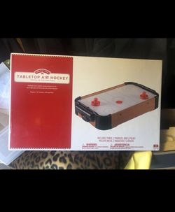 Tabletop air hockey