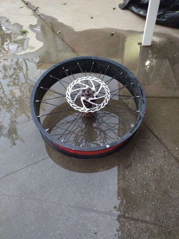 20" Front" Fat Tire" Rim For E Bikes. Used Works Just Fine Color Black W Orange Anadised Hub