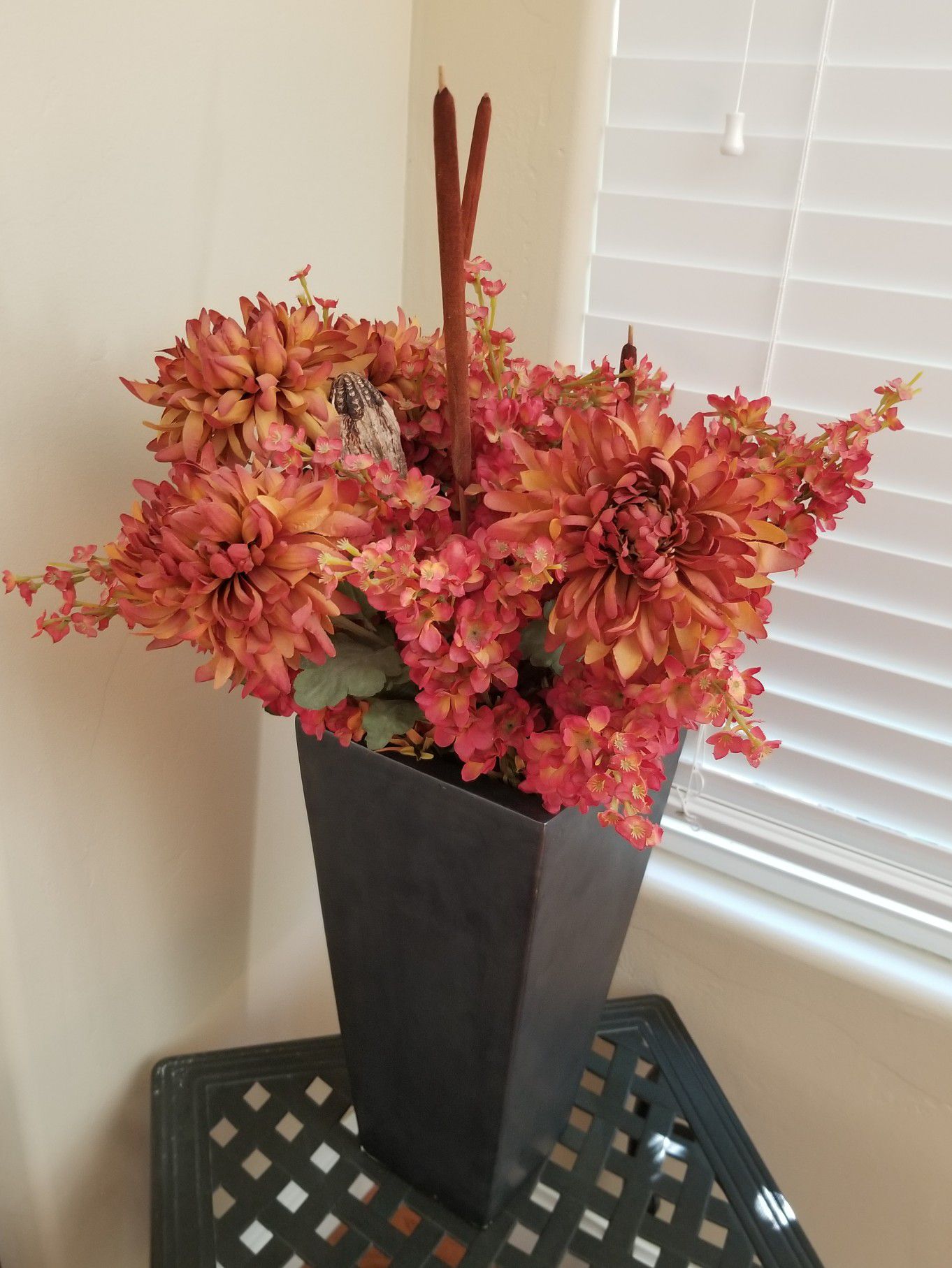 Artificial flowers and vase