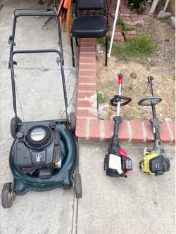 Used Lawn Mower and Two String Trimmers