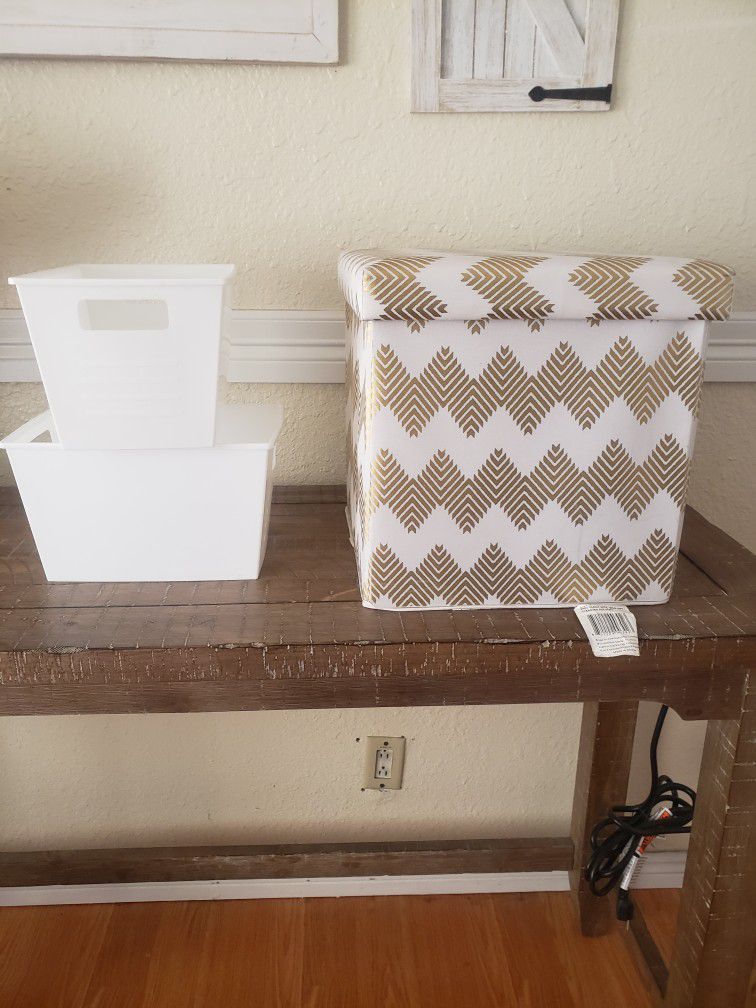 One Storage Ottoman And Two Plastic Storage Containers 
