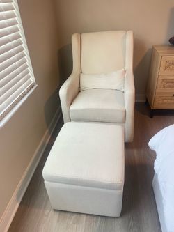 Cream wingback chair with storage ottoman