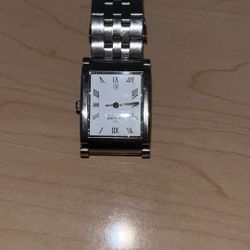 Skagen Denmark watch with a stainless steel band and Roman numeral dial. 