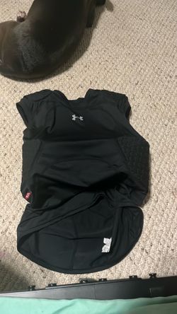 Under Armour shirt football pads