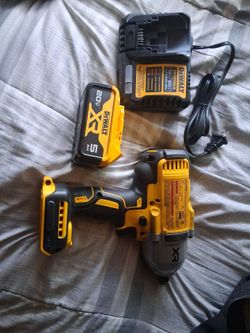 DEWALT 20V MAX XR 1/2-inch High Torque Impact Wrench, model DCF900./DEWALT 20V MAX XR 5.0Ah Lithium-Ion Battery Pack.\DeWalt DCB1104 12V/20V MAX 4 Amp