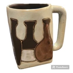 Mara stoneware mug , 4 1/2 " high 3" opening 