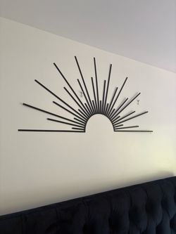 Black Metal Sunburst Wall Art