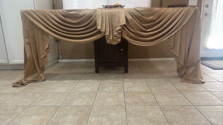 draped over a curtain