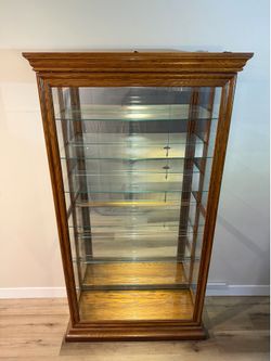 Sliding door curio cabinet
