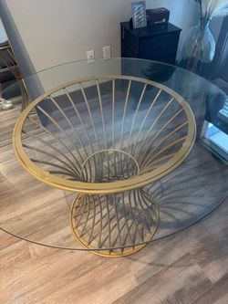 Glass table with gold base