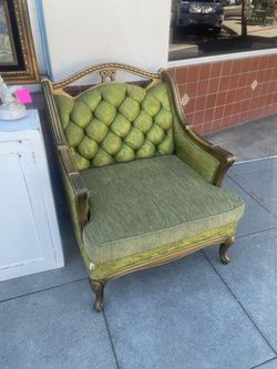 Antique gold green tuffted chair solid sturdy comfortable has tear