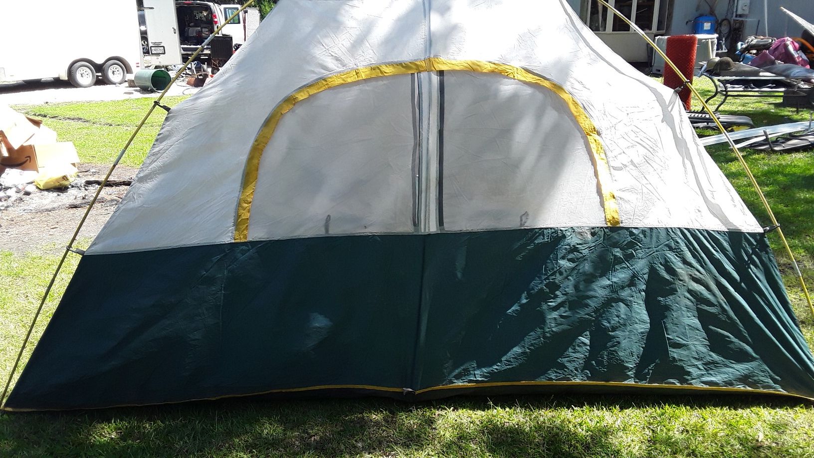 tent sleeps 8 used 1 time has rain cover