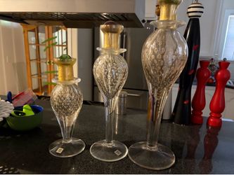 Beautiful crystal three candle holders small large, small and small smaller