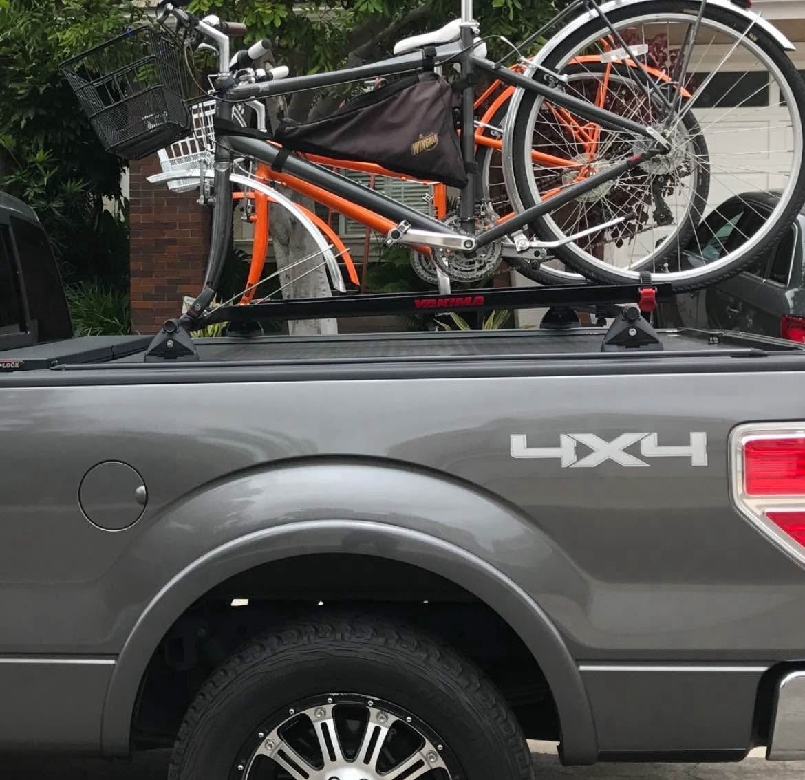Yakima Truck Bed Bike rack. Set up for two bikes. Includes truck bed rails.