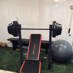 Gym Equipment Adjustable Bench press, barbell, leg developer and 100lbs of weight