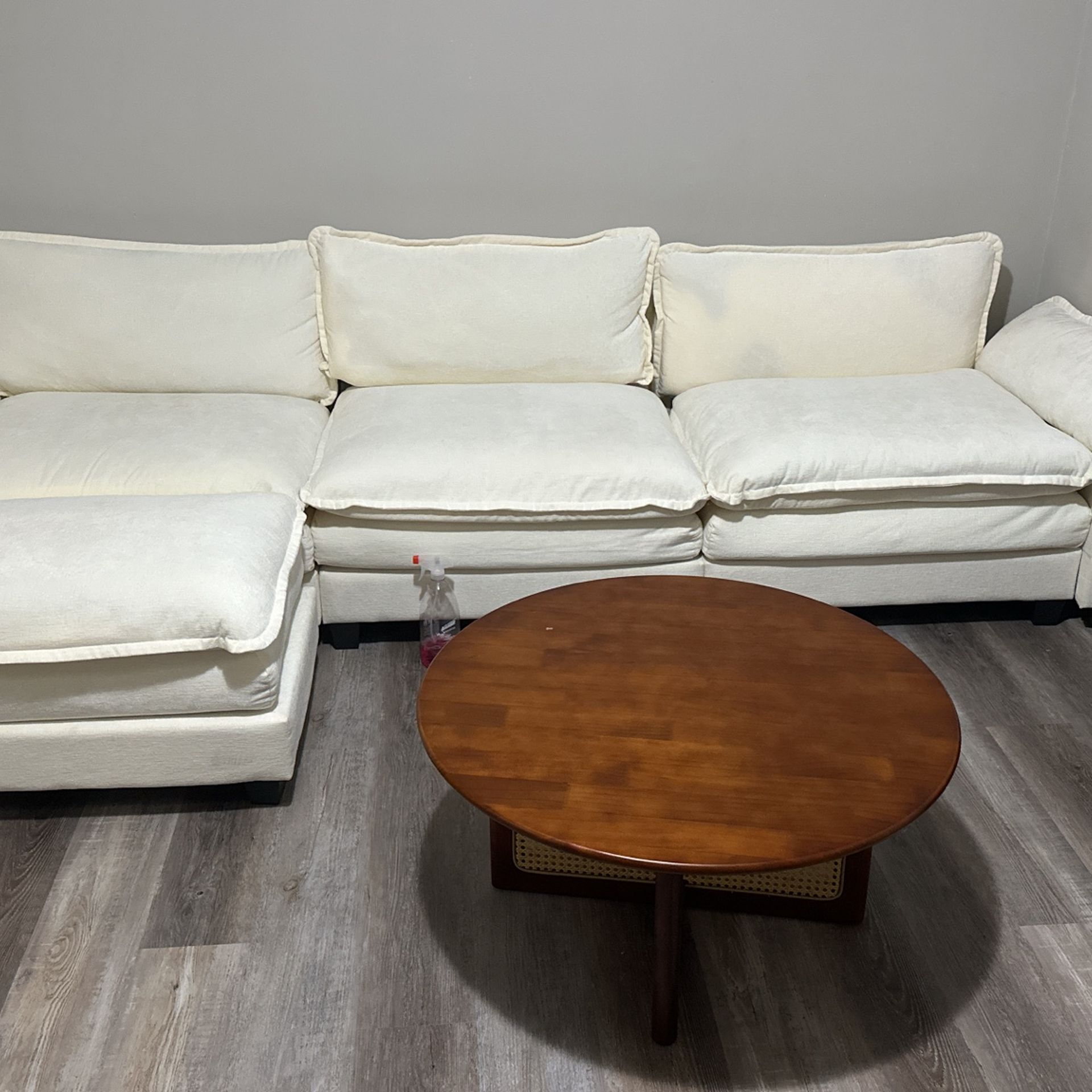 Beige Chenille Modular Couch And Walnut Rattan Coffee Table 