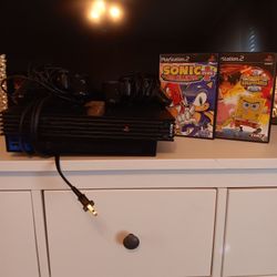 PS2 with 2 Controllers and 2 Games