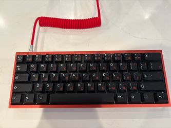 Custom Wooting60HE with stock keycaps, frame, and switches too