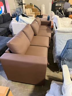 Brown leather Sectional Sofa ($300)