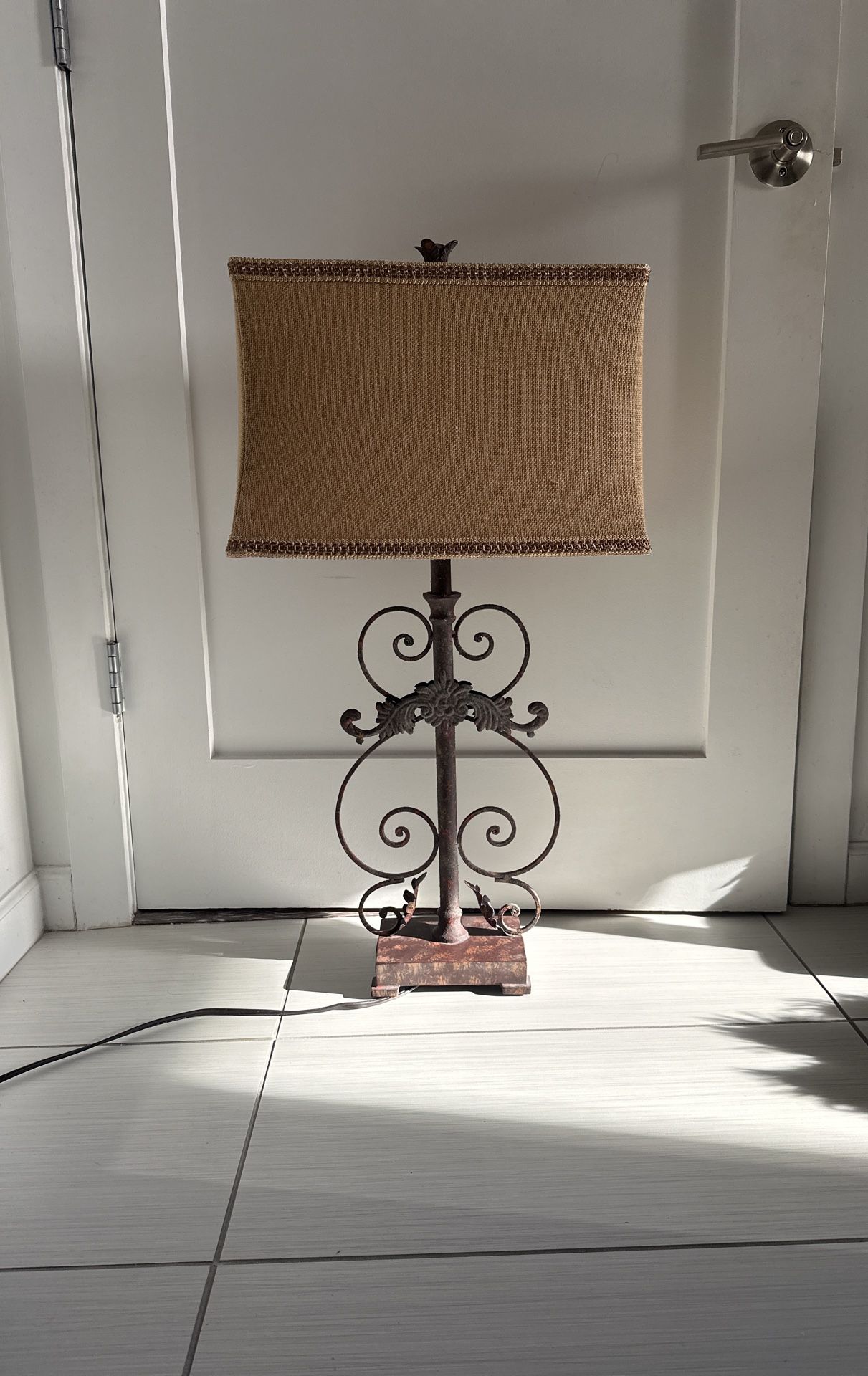 Two antique bronze lamps