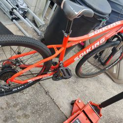 2 Mountain Bikes And A Bike Carrier 