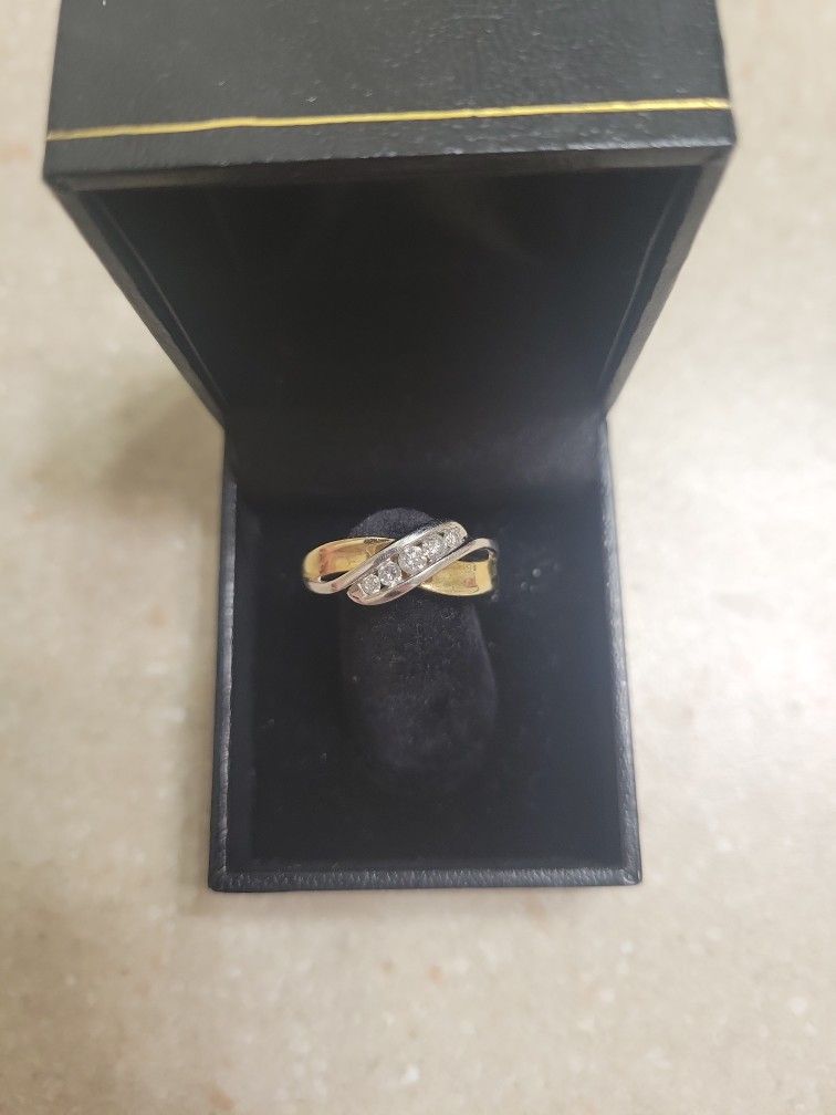 10 K Gold Diamond Ring.  Weight Is 2.9 Grams 