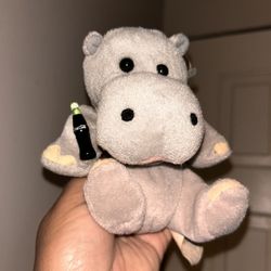 Coca-Cola International Collection bean bag plush toy featuring "Meeska" the Hippo