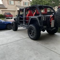 Jeep Wrangler JK Unlimited Tube Doors And Roll N Jack Top Lift