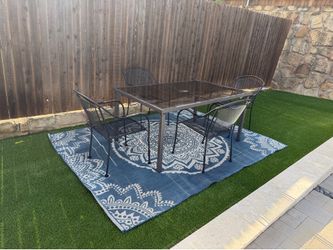 Patio Table, chairs and Rug