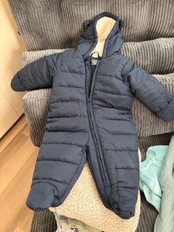 Size 6-9 months quilted children’s snowsuit with hood and fleece lining
