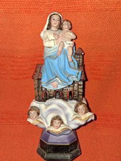 A lady with the babies
