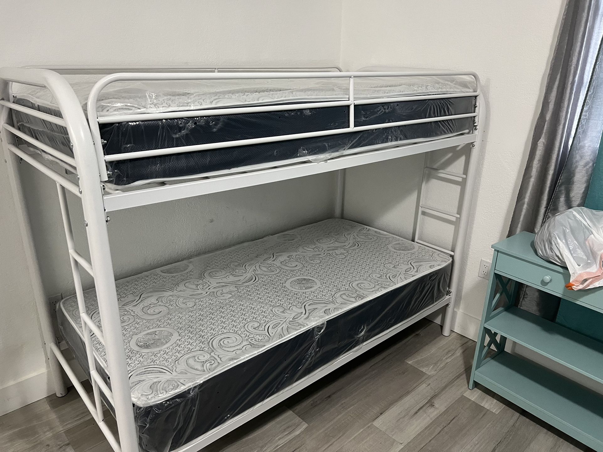 Twin over Twin bunk beds frame and free delivery in box with the mattress and